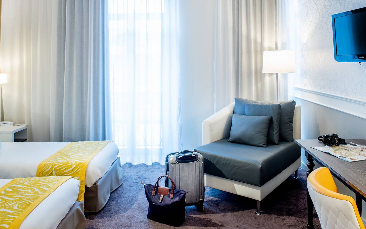 Suitcase in a room, 4-star hotel Lourdes, Hôtel Gallia